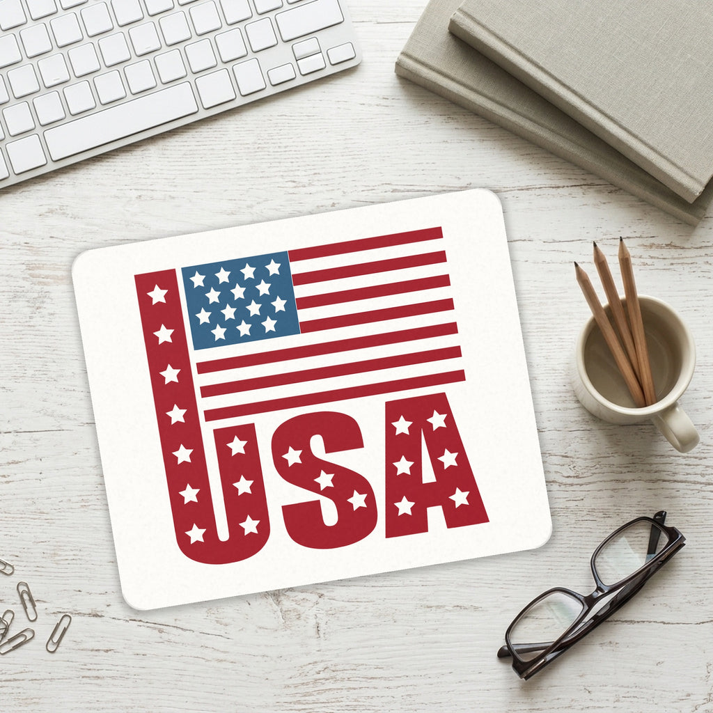 USA Flag Banner Red White & Blue mouse pad on a desk with a keyboard