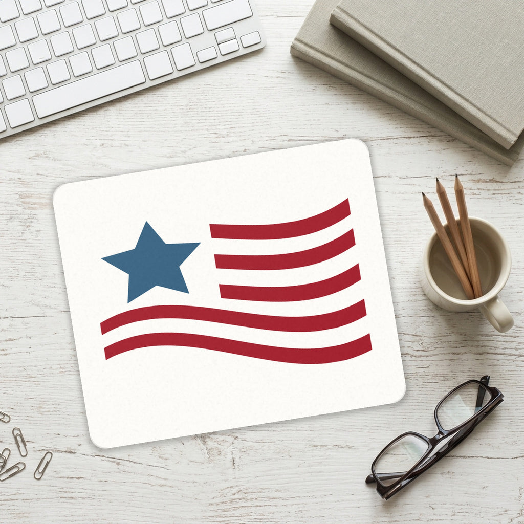 USA Waving Flag Red White & Blue mouse pad on a desk with a keyboard