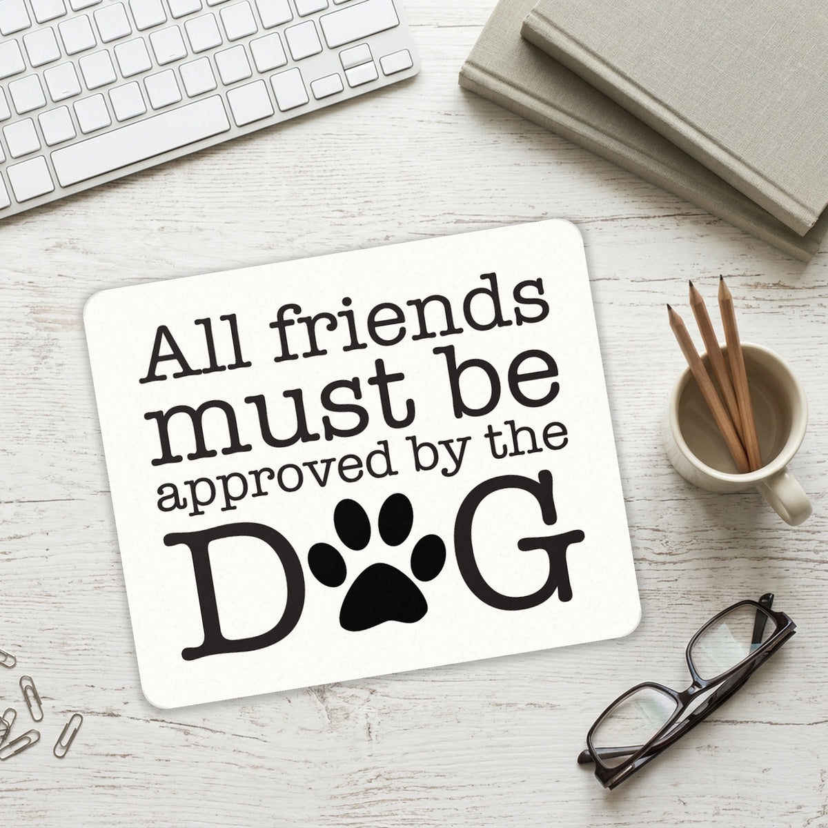 All Friends Must Be Approved by the Dog mouse pad on a desk with a keyboard