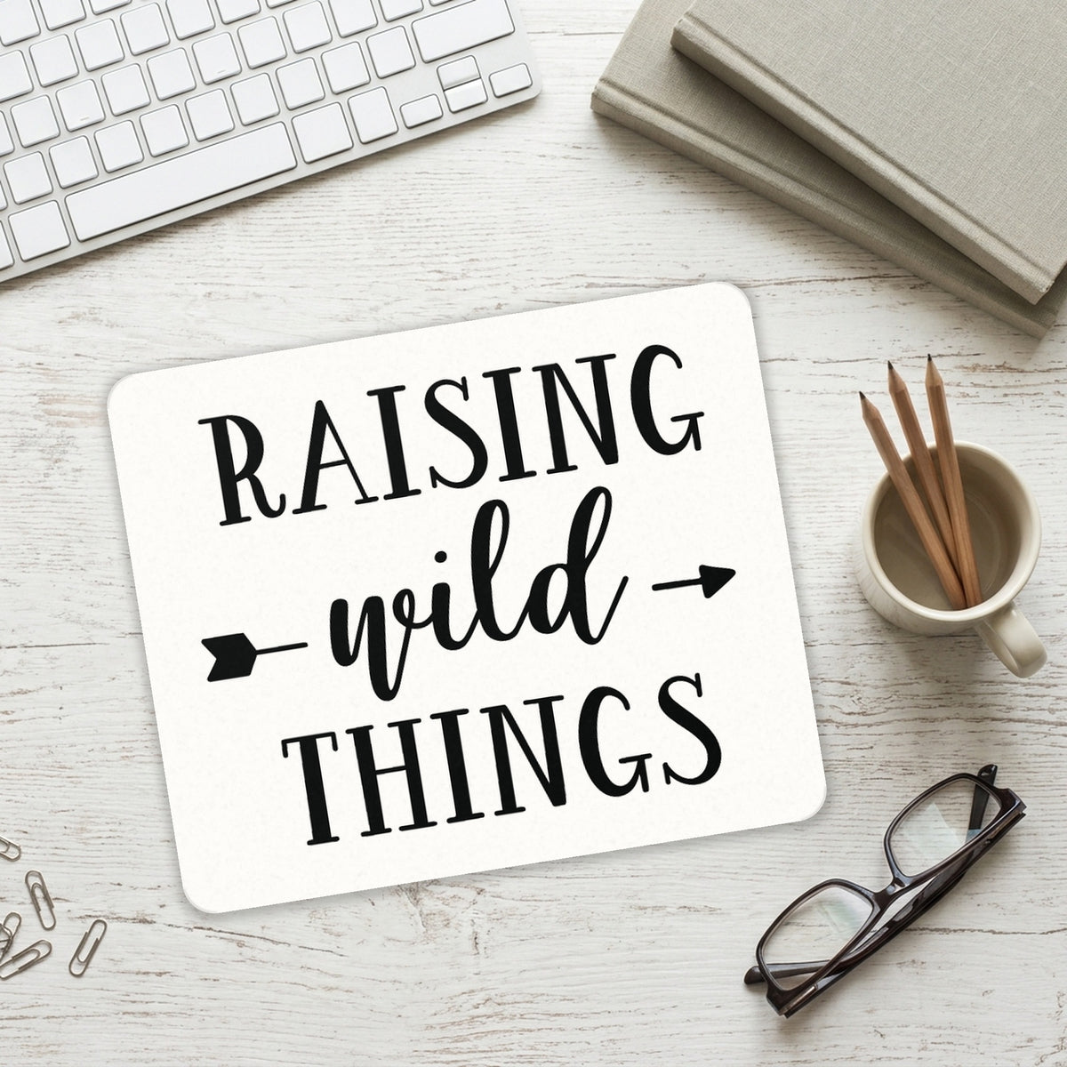 Raising Wild Things - Mom mouse pad on a desk with a keyboard