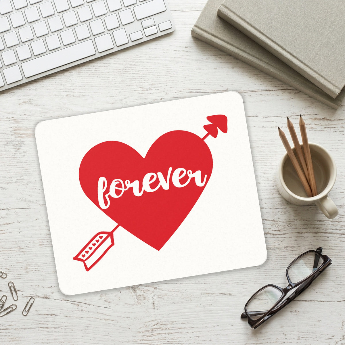 Heart Arrow Forever Valentine mouse pad on a desk with a keyboard