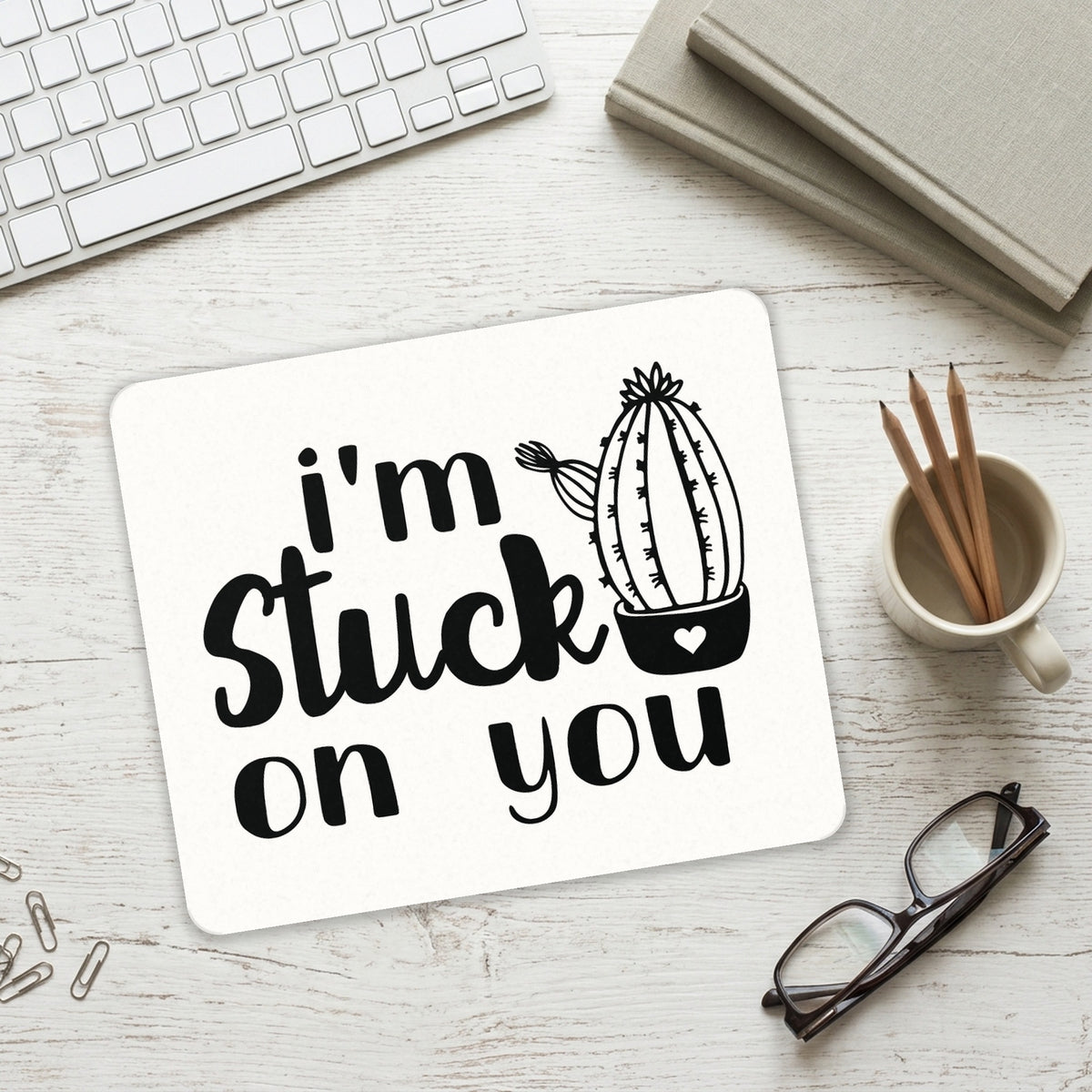 I'm Stuck On You Cactus mouse pad on a desk with a keyboard
