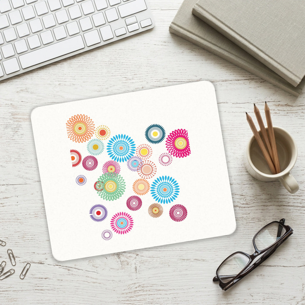 Cartoon Wildflowers Rainbow Colors mouse pad on a desk with a keyboard