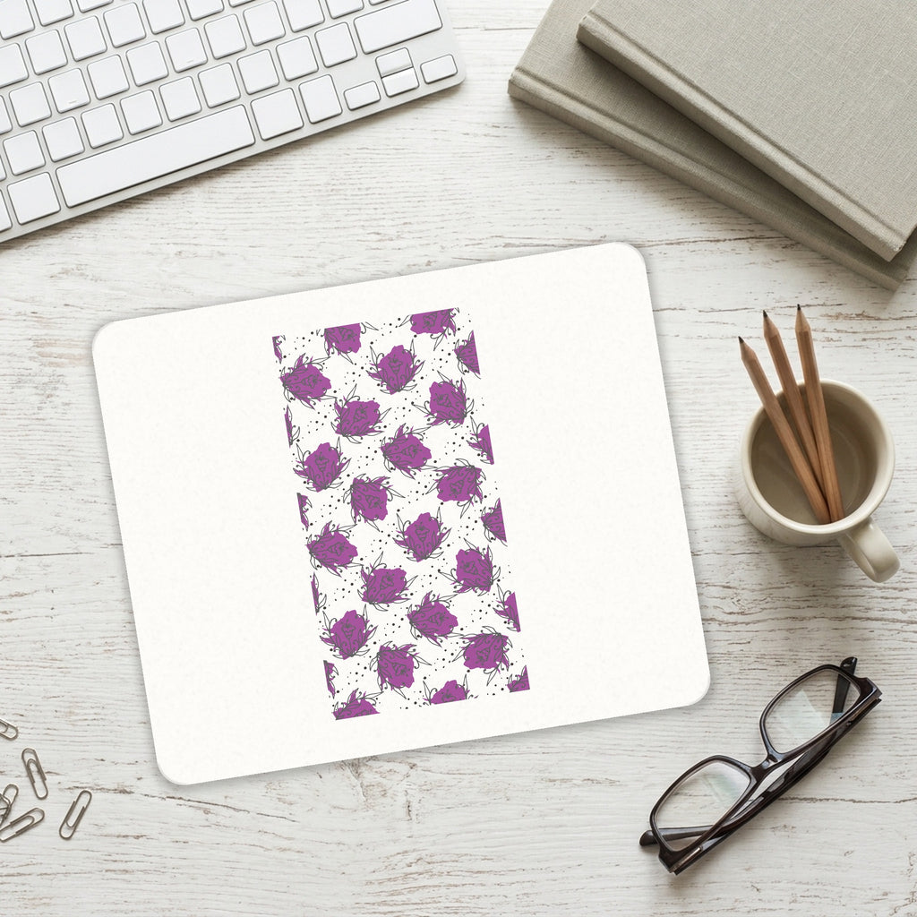 Wildflower Purple Graffiti mouse pad on a desk with a keyboard