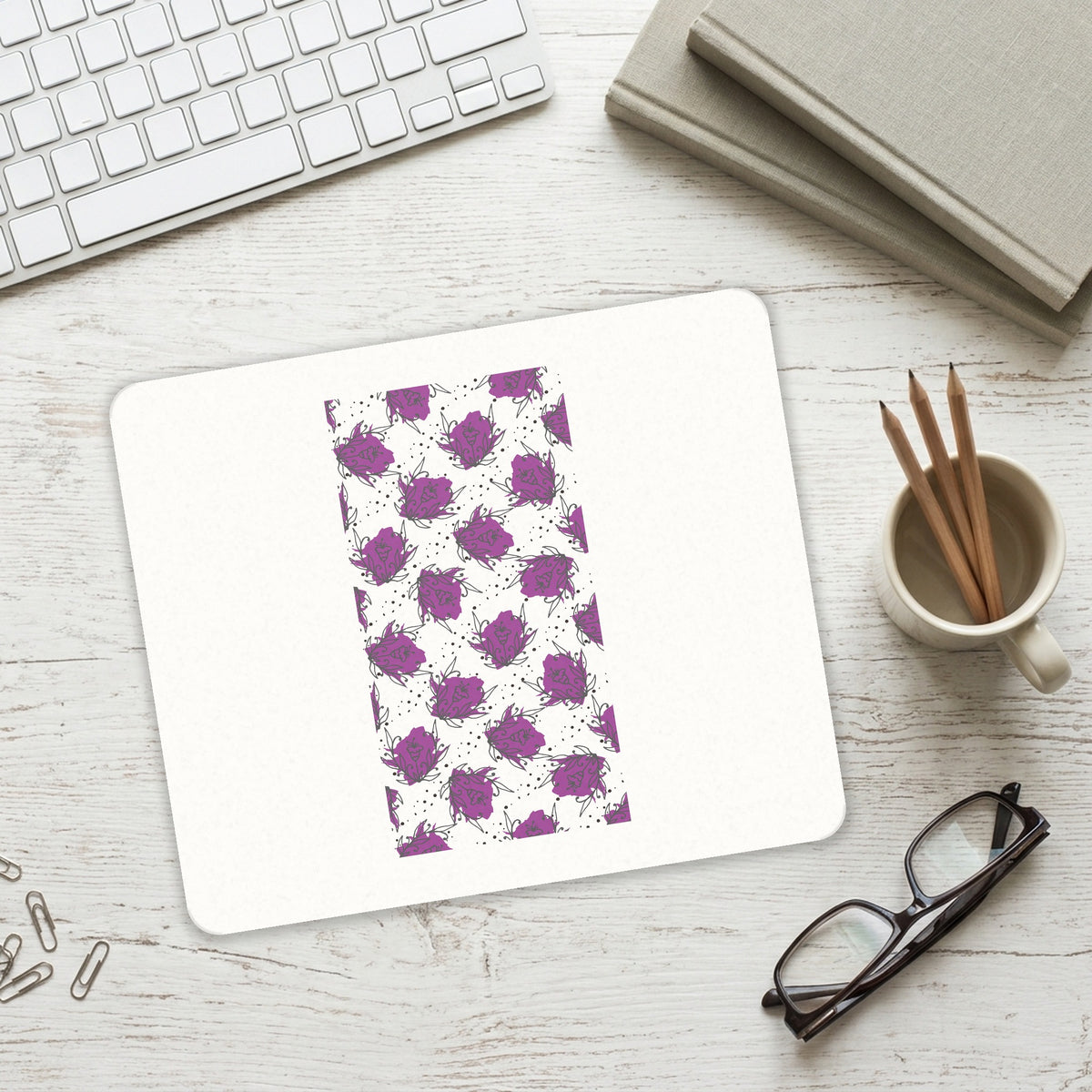 Wildflower Purple Graffiti mouse pad on a desk with a keyboard