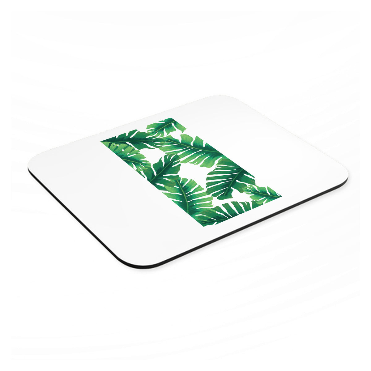 Tropical Banana Leaves mouse pad, angled view showing the 1/4 inch thick base