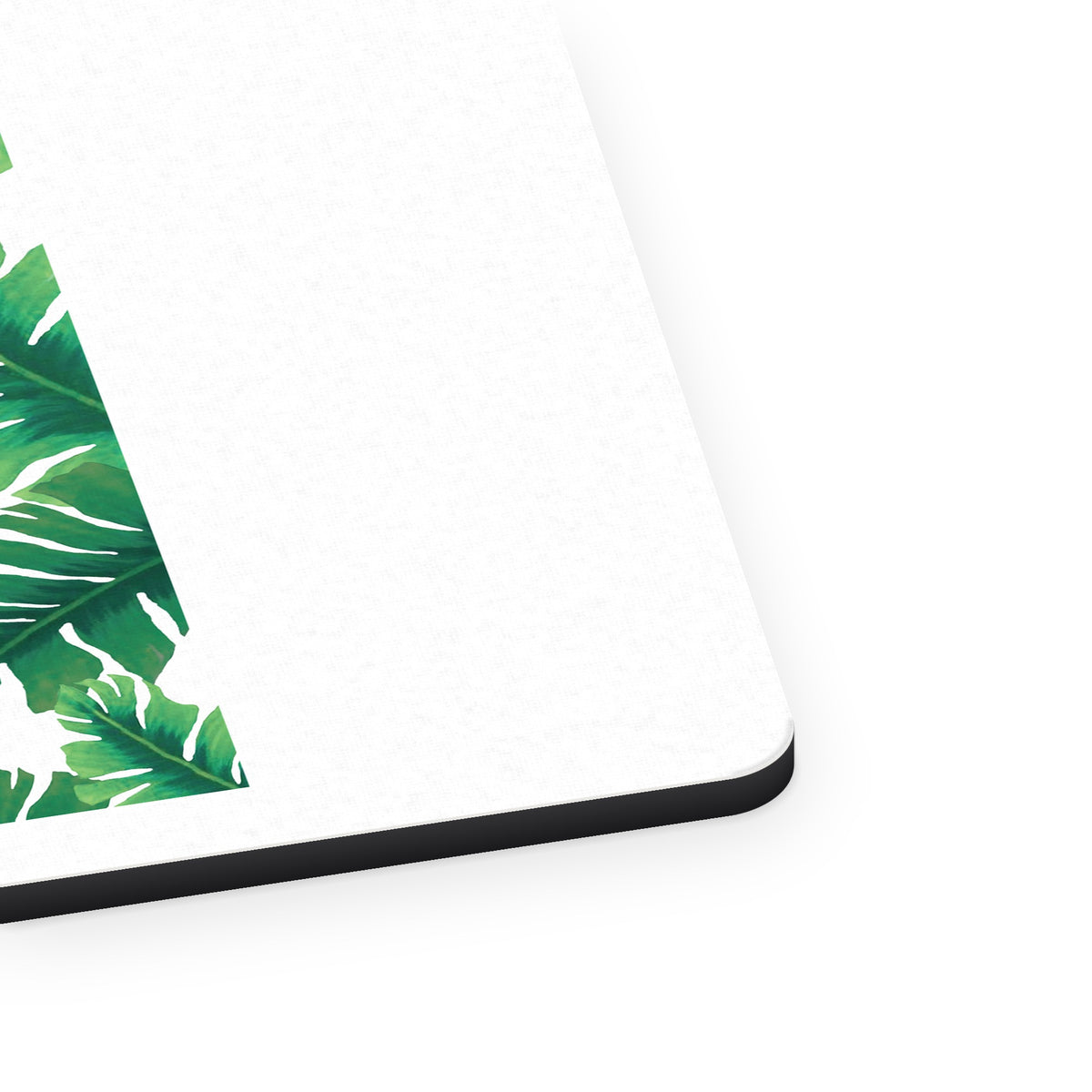 Tropical Banana Leaves mouse pad, close-up of the fabric surface and rubber edge