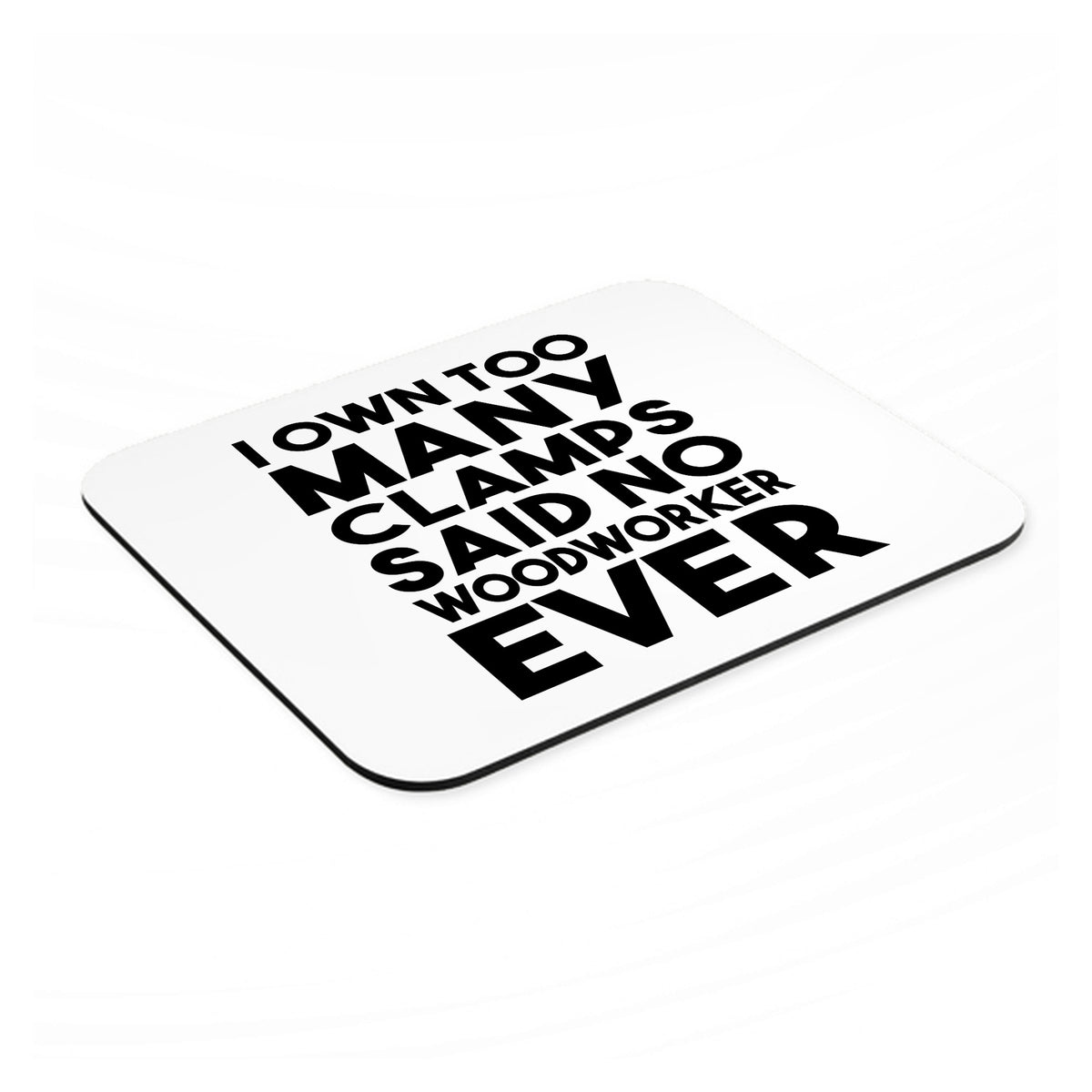 Own Too Many Clams - No Woodworker Ever mouse pad, angled view showing the 1/4 inch thick base
