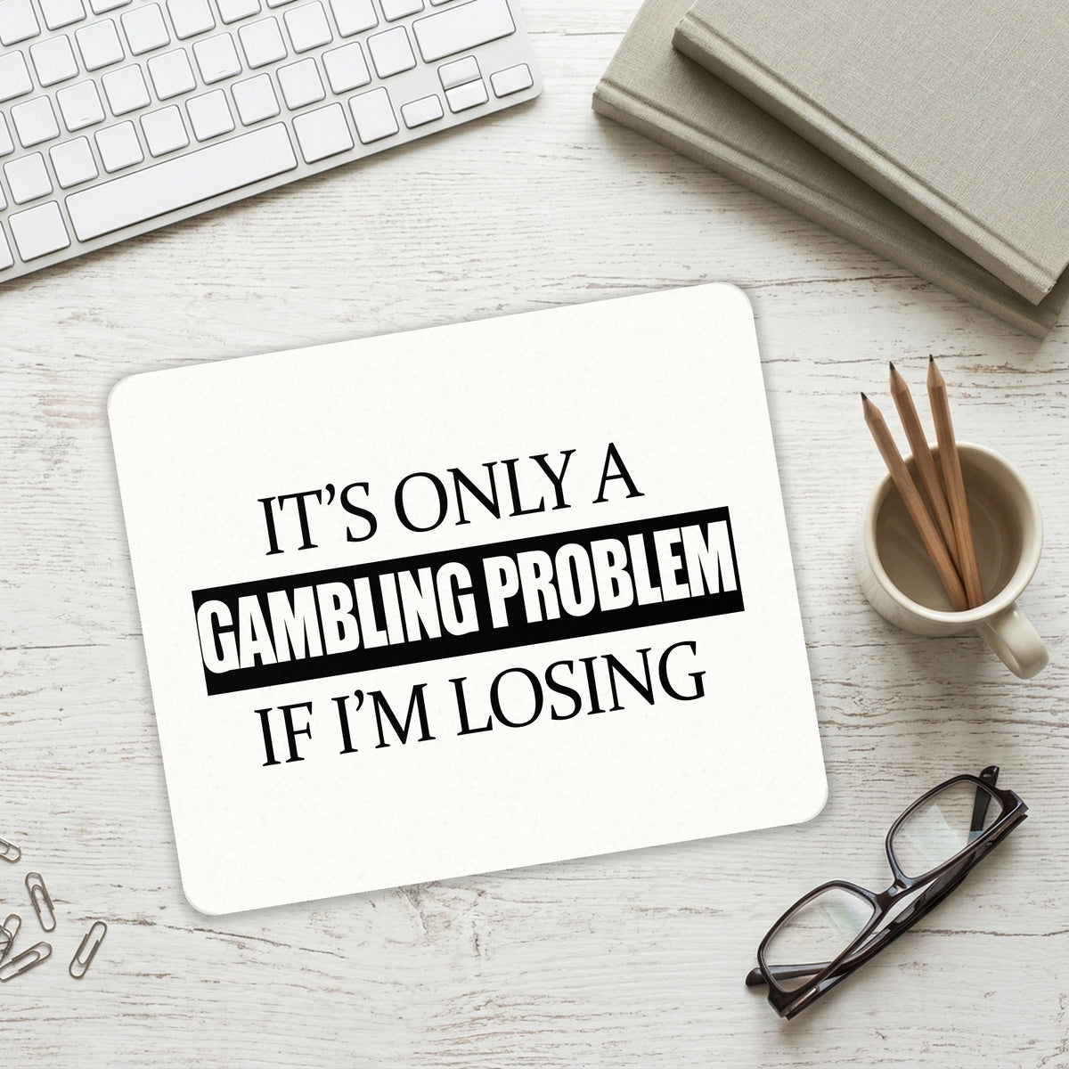 It's Only a Gambling Problem if I'm Losing mouse pad on a desk with a keyboard