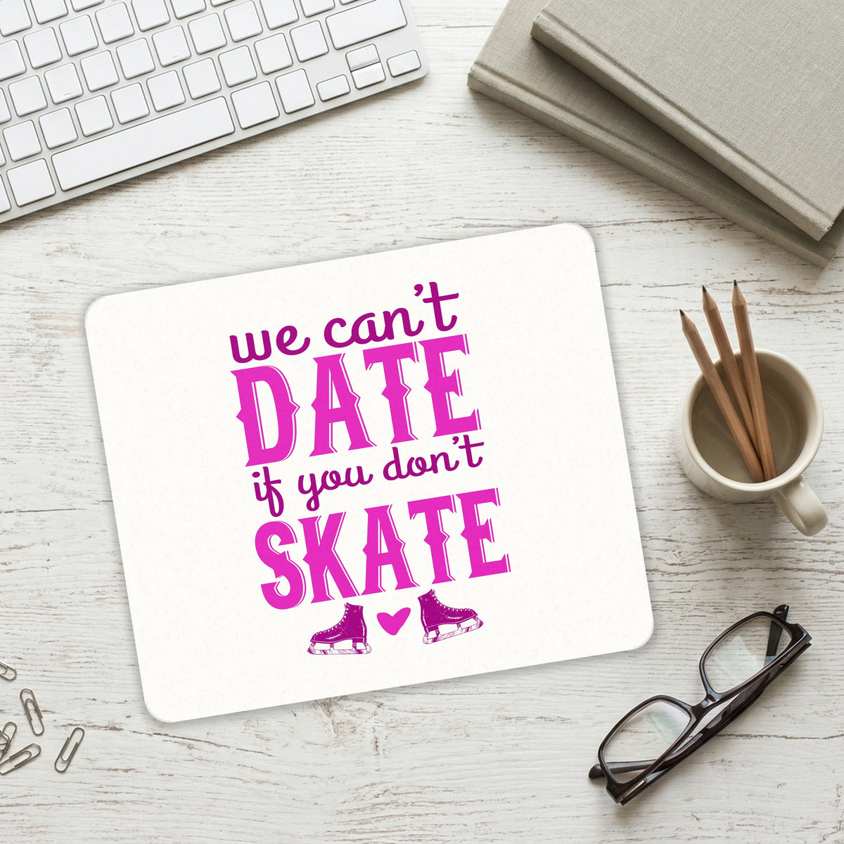 We Can't Date If You Don't Skate mouse pad on a desk with a keyboard