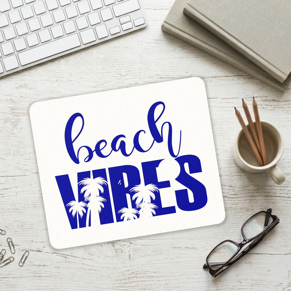 Beach Vibes mouse pad on a desk with a keyboard