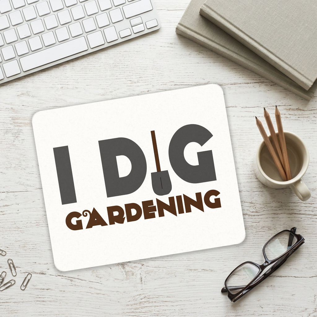 I Dig Gardening mouse pad on a desk with a keyboard