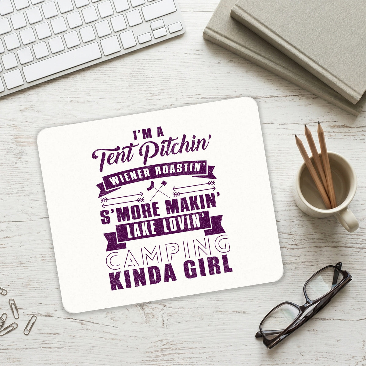 Tent Pitchin Weiner Roastin S'More Camping Girl mouse pad on a desk with a keyboard