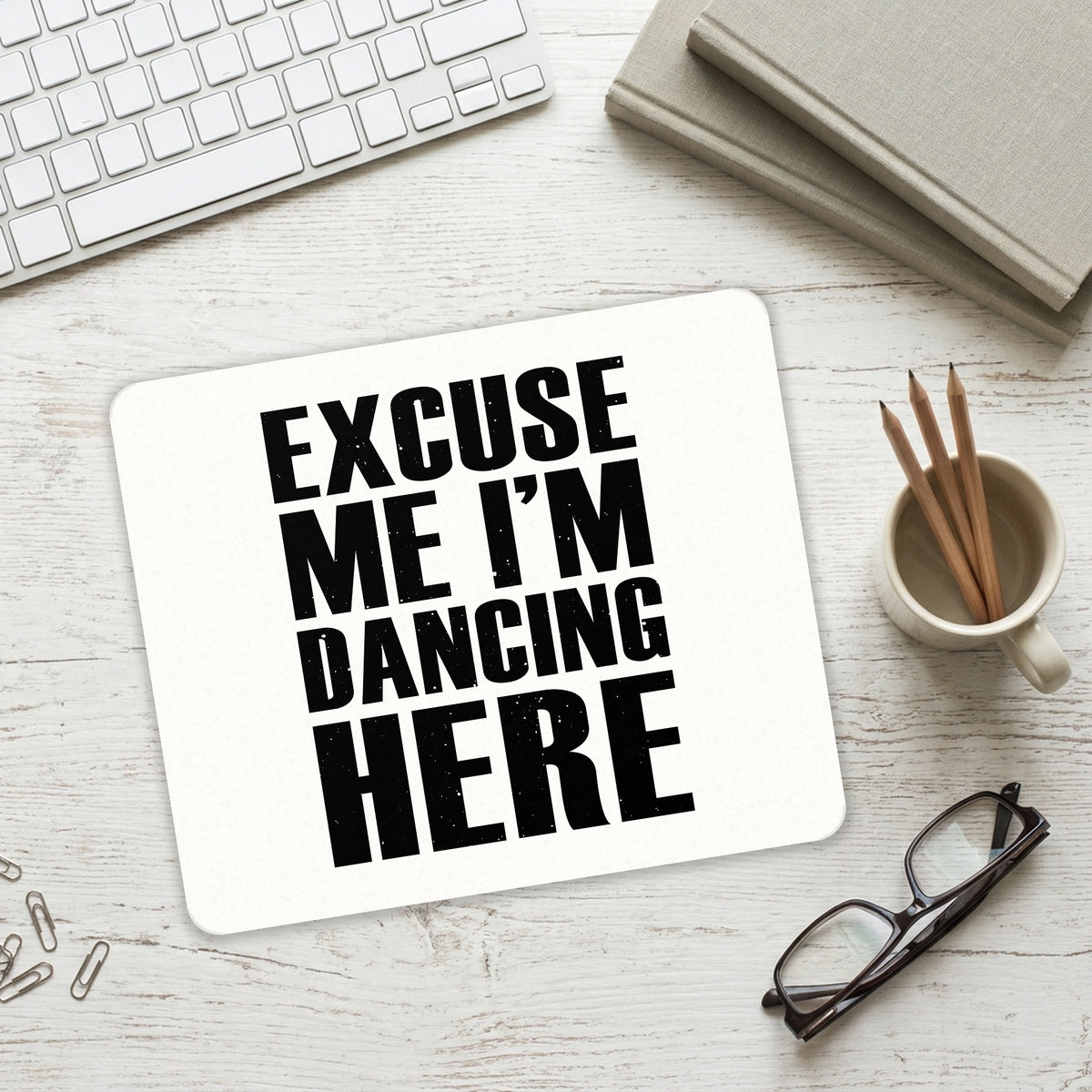 Excuse Me I'm Dancing Here mouse pad on a desk with a keyboard