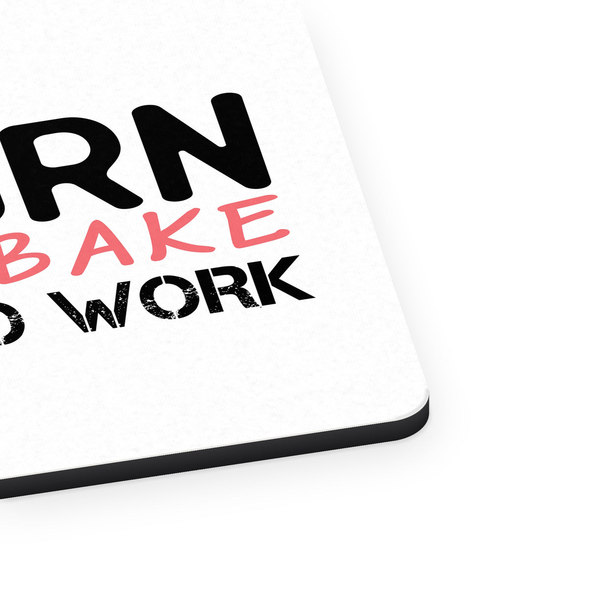 Born to Bake Forced to Work mouse pad, close-up of the fabric surface and rubber edge