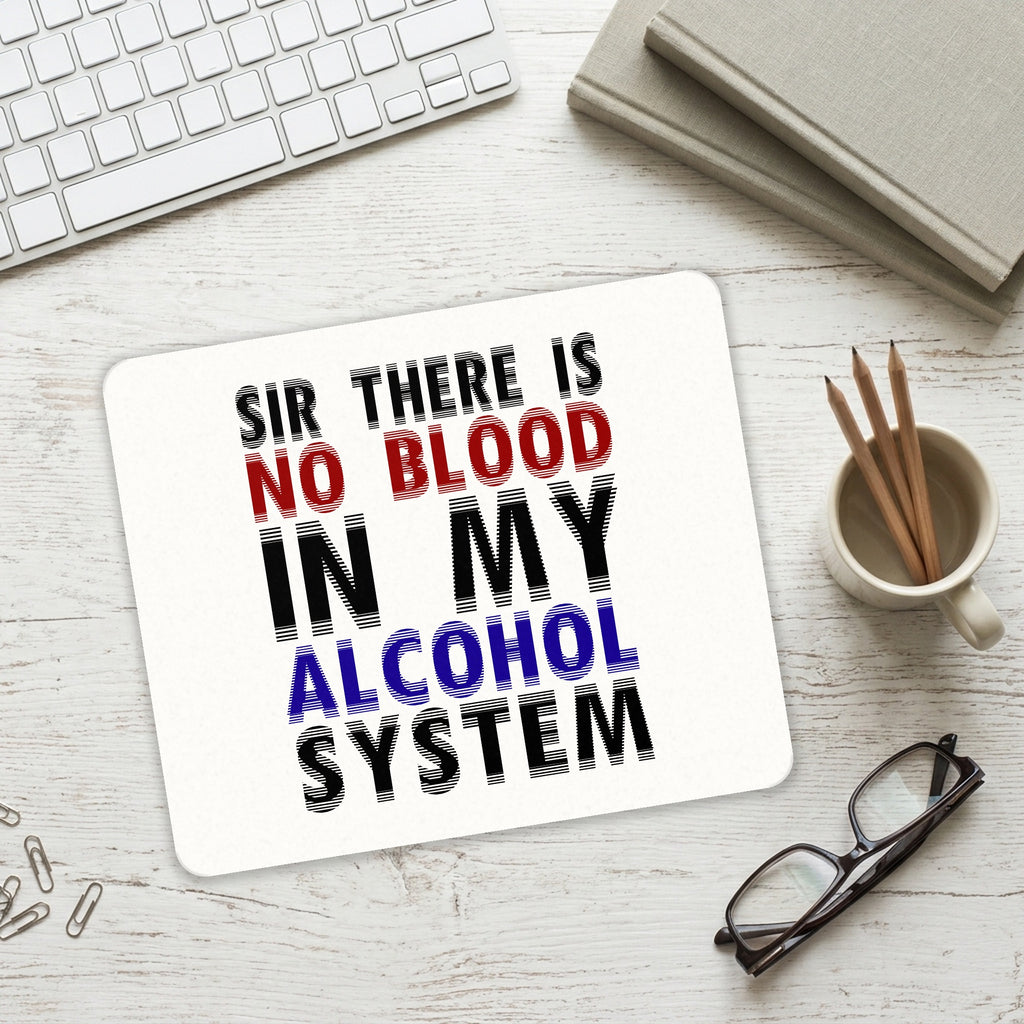Sir There is Blood in My Alcohol System mouse pad on a desk with a keyboard