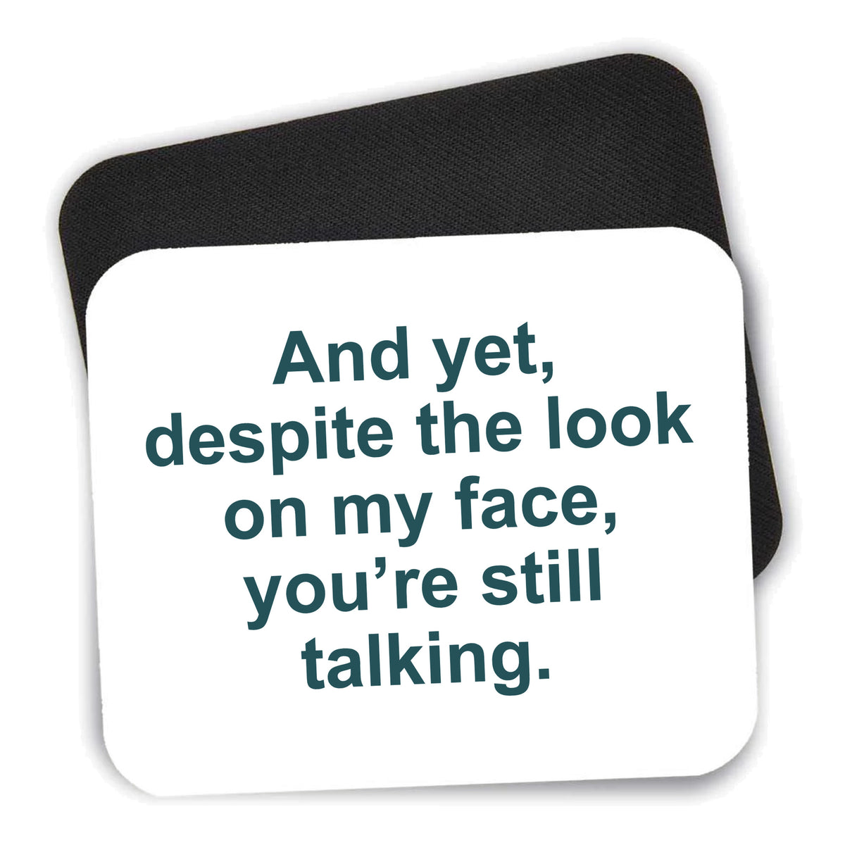 Despite the Look On My Face, Still Talking mouse pad shown with its black non-slip rubber underside
