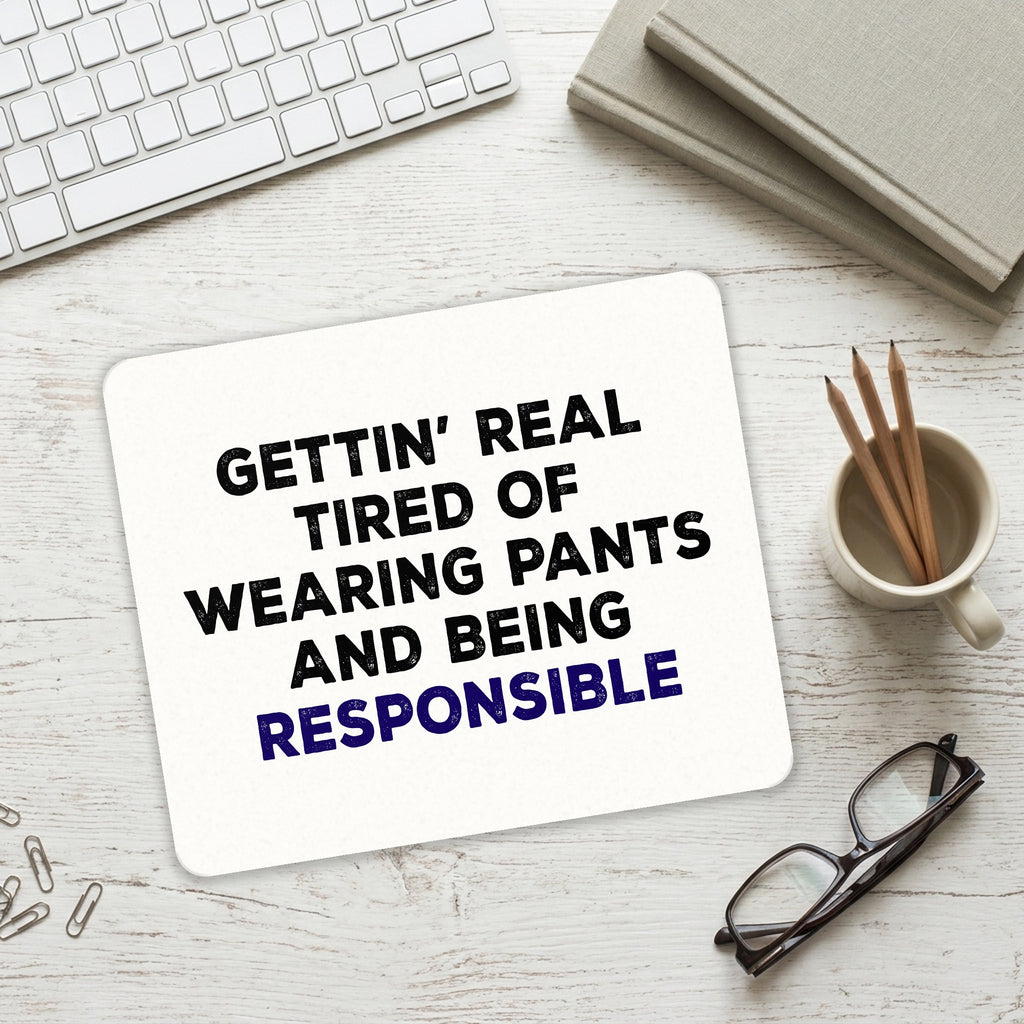Getting' Tired of Pants & Being Responsible mouse pad on a desk with a keyboard