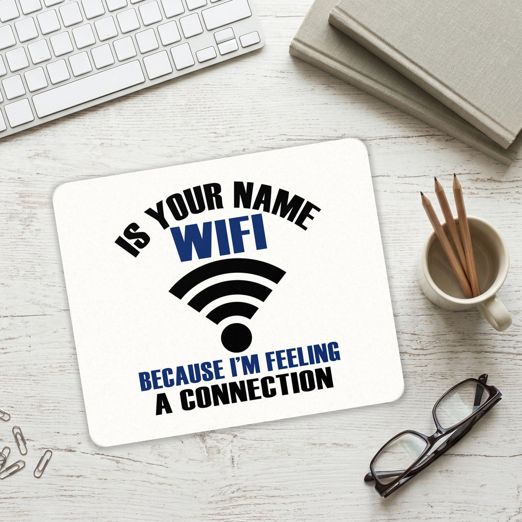 Is Your Name WiFi I'm Feeling a Connection mouse pad on a desk with a keyboard