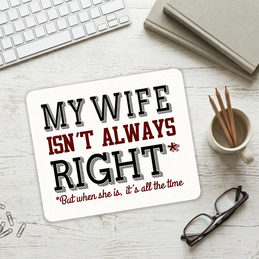 My Wife Isn't Always Right. mouse pad on a desk with a keyboard