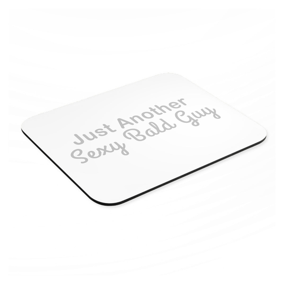 Just Another Sexy Bald Guy mouse pad, angled view showing the 1/4 inch thick base