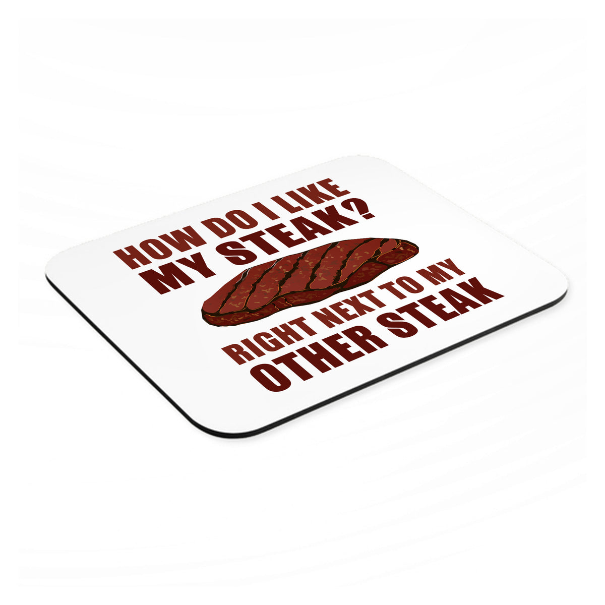 Like My Steak Next to My Other Steak mouse pad, angled view showing the 1/4 inch thick base