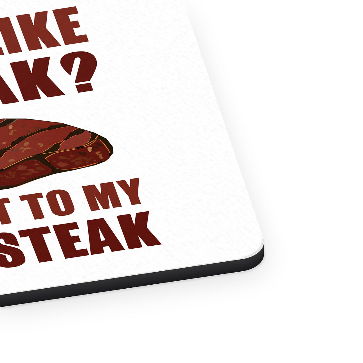Like My Steak Next to My Other Steak mouse pad, close-up of the fabric surface and rubber edge