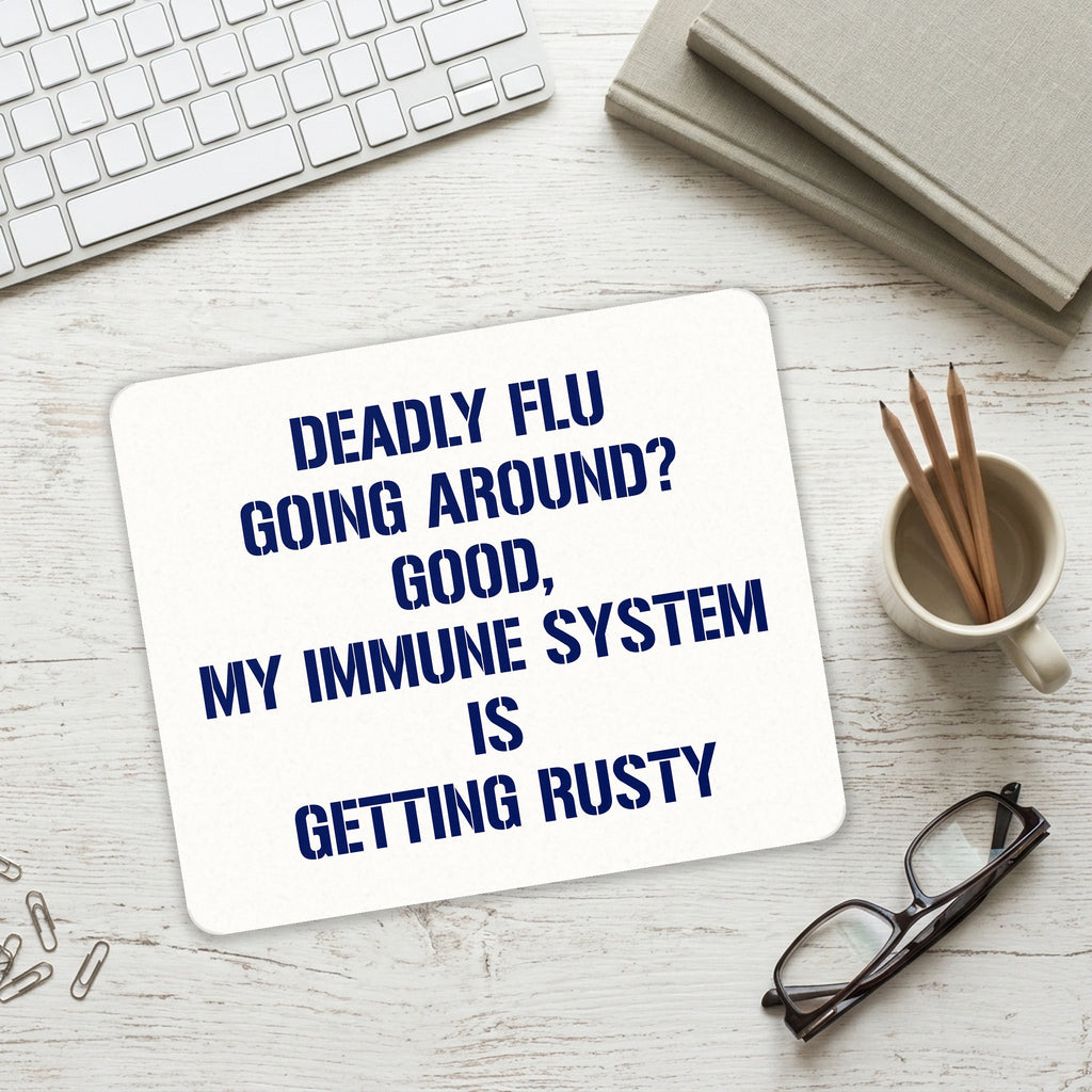 Deadly Flu? Good, Immune System is Rusty mouse pad on a desk with a keyboard