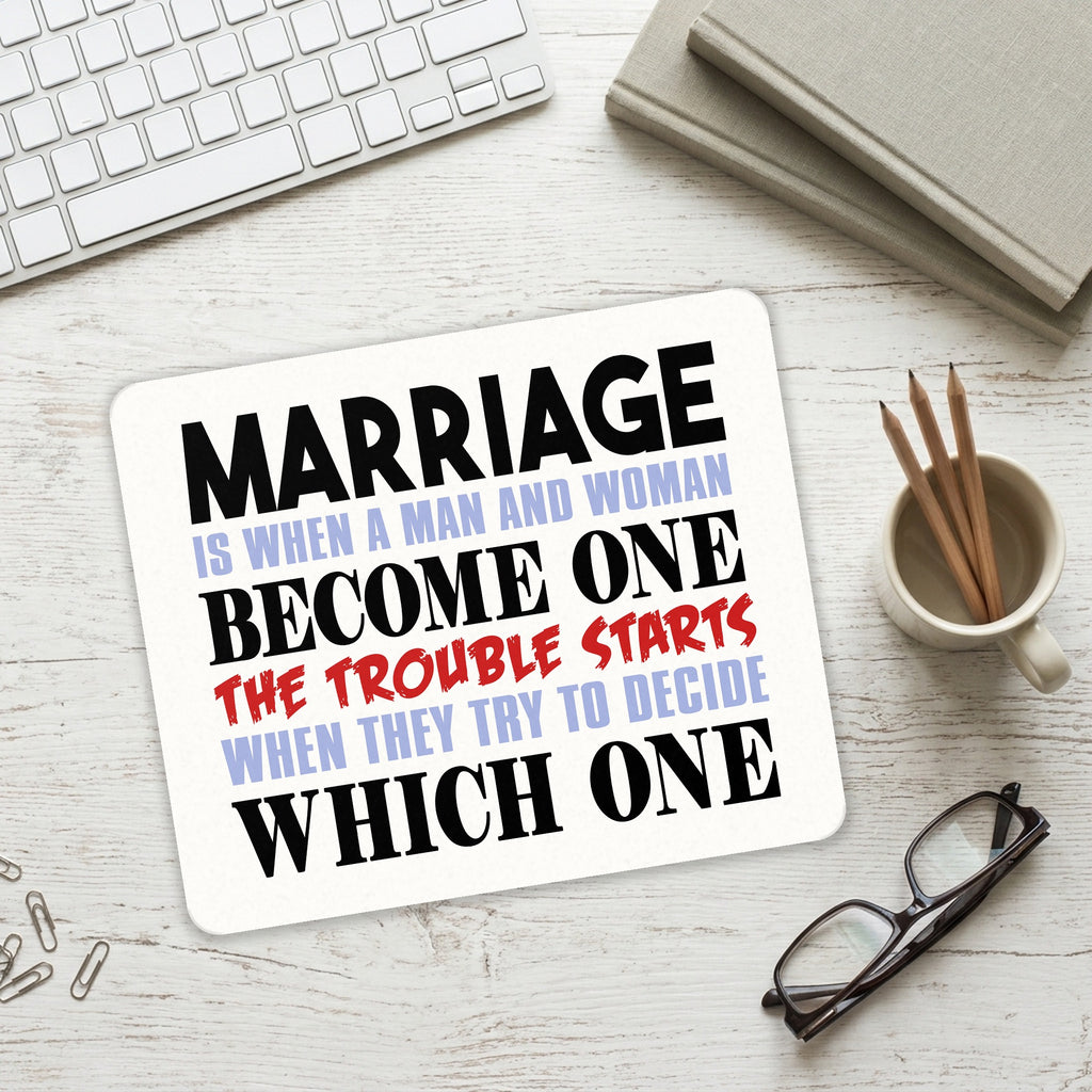 Marriage Trouble Starts mouse pad on a desk with a keyboard