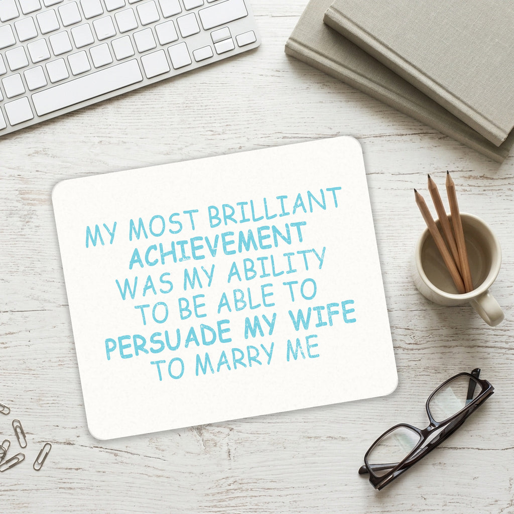 Persuade My Wife to Marry Me mouse pad on a desk with a keyboard