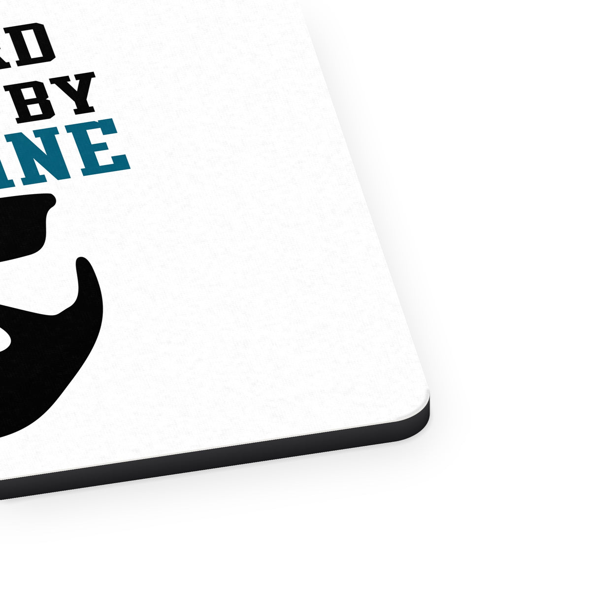 This Beard is Fueled by Moonshine mouse pad, close-up of the fabric surface and rubber edge