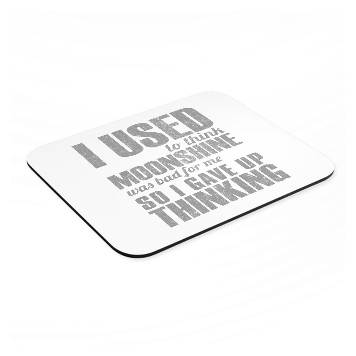 I Used to Think Moonshine Was Bad For Me mouse pad, angled view showing the 1/4 inch thick base