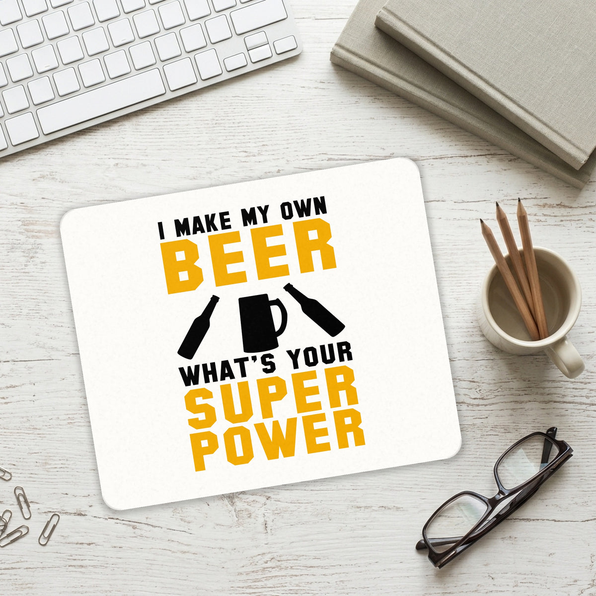 I Make Beer What's Your Super Power mouse pad on a desk with a keyboard