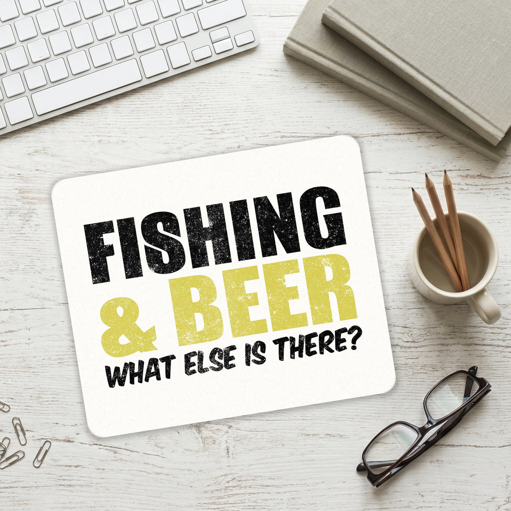 Fishing & Beer. What Else is There? mouse pad on a desk with a keyboard