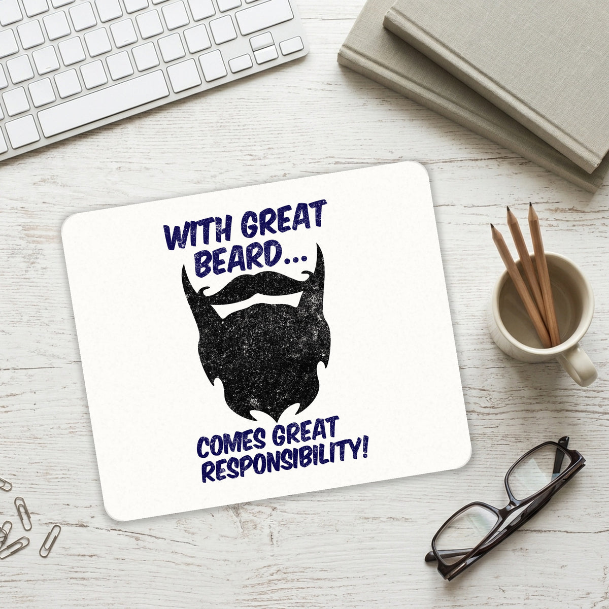 With Great Beard Comes Great Responsibility mouse pad on a desk with a keyboard