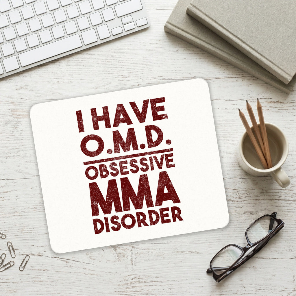 I Have OMD - Obsessive MMA Disorder mouse pad on a desk with a keyboard