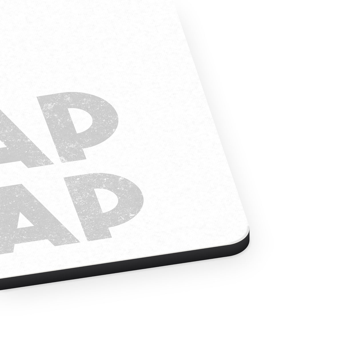 Tap Snap or Nap mouse pad, close-up of the fabric surface and rubber edge