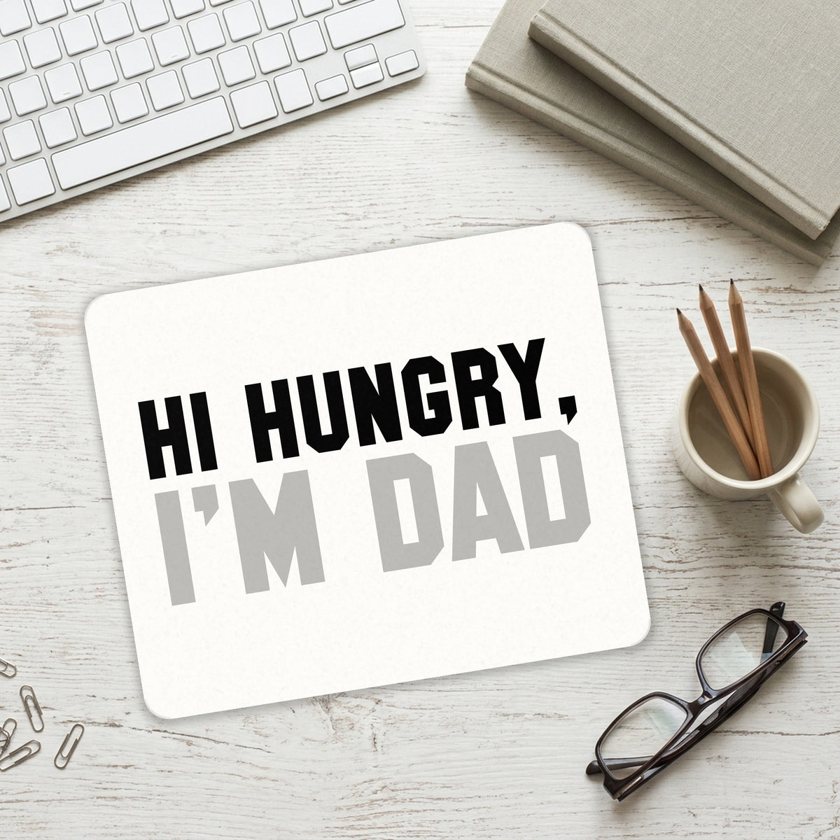 Hi Hungry, I'm Dad mouse pad on a desk with a keyboard