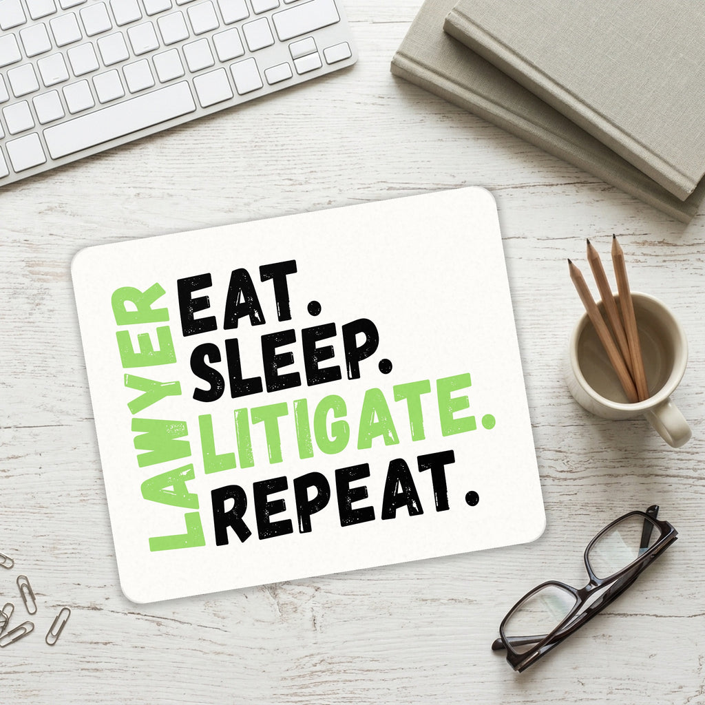 Lawyer Eat Sleep Litigate Repeat mouse pad on a desk with a keyboard