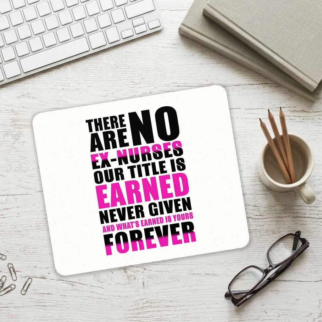 No Ex Nurses Title is Earned Forever mouse pad on a desk with a keyboard
