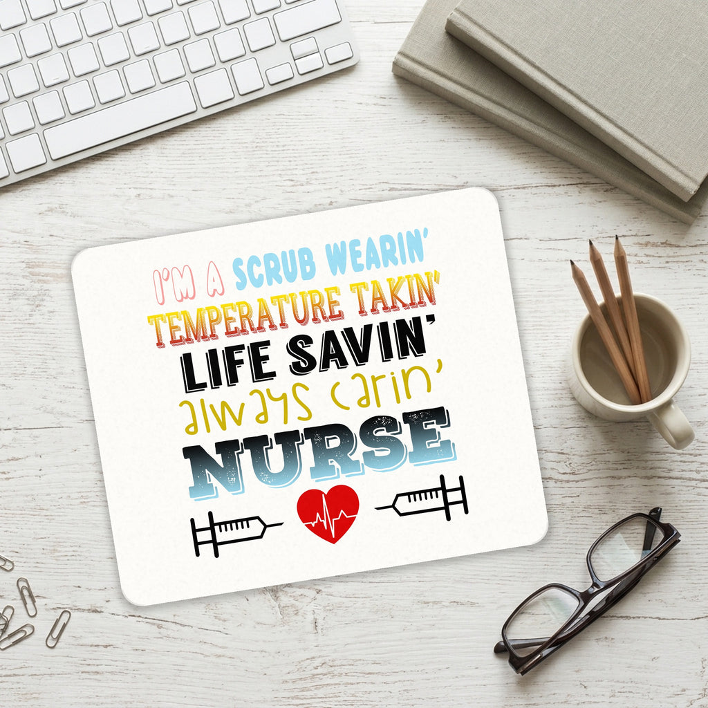 Scrub Wearing Temp Taking Life Saving Nurse mouse pad on a desk with a keyboard