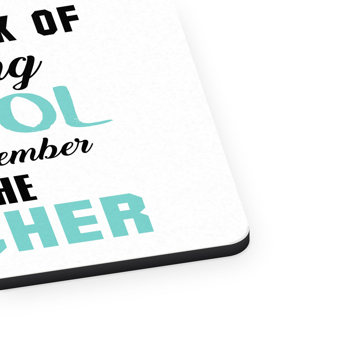 Think of Skipping School Remember I'm Teacher mouse pad, close-up of the fabric surface and rubber edge