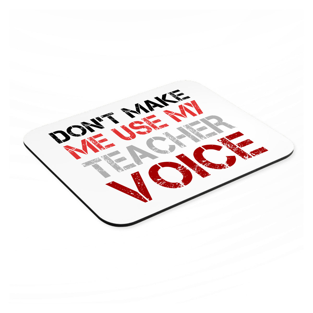 Don't Make Me Use My Teacher Voice mouse pad, angled view showing the 1/4 inch thick base