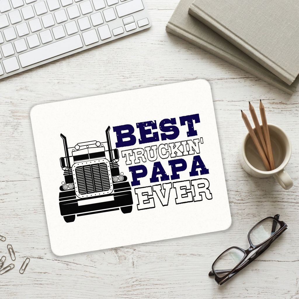 Best Truckin' Papa Ever mouse pad on a desk with a keyboard
