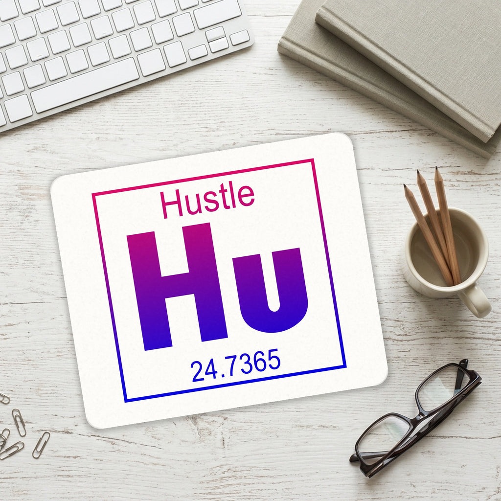 Entrepreneur Hustle Hu Element mouse pad on a desk with a keyboard