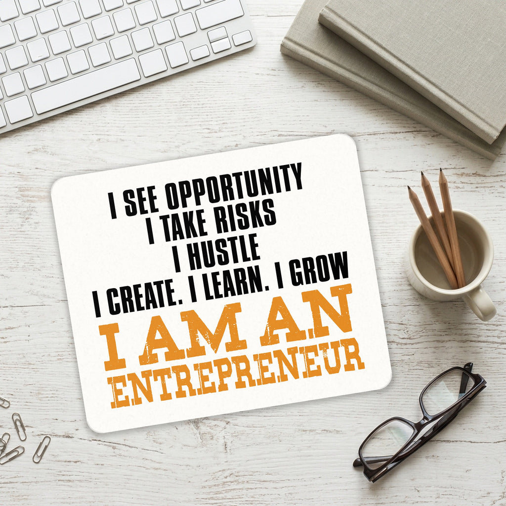 Entrepreneur Opportunity Risks Hustle mouse pad on a desk with a keyboard