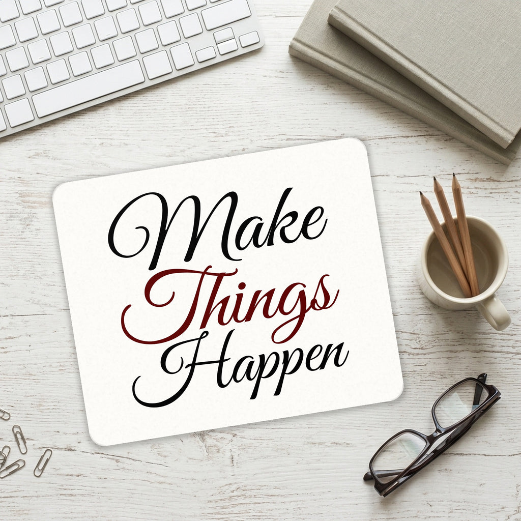 Make Things Happen mouse pad on a desk with a keyboard