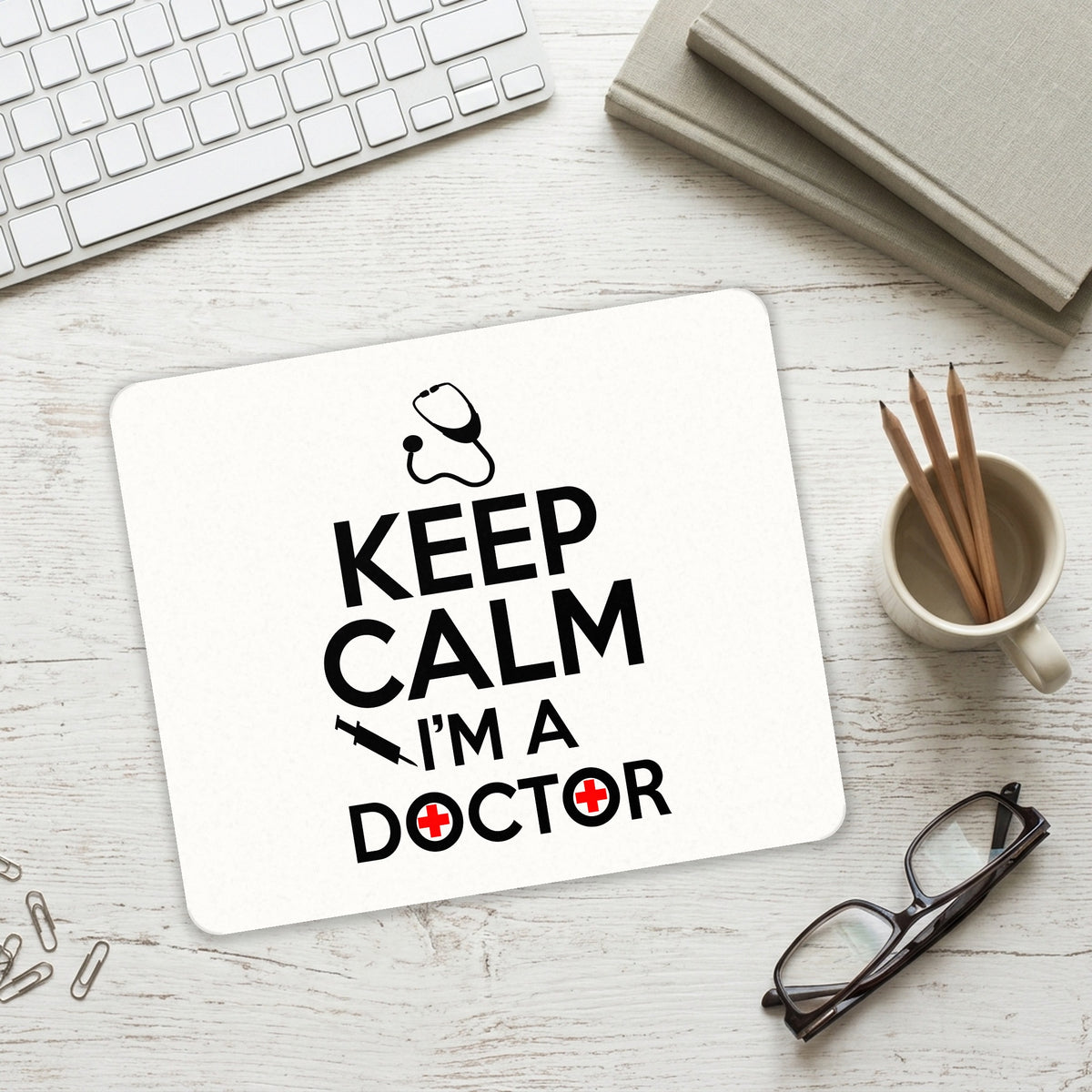 Keep Calm I'm A Doctor mouse pad on a desk with a keyboard
