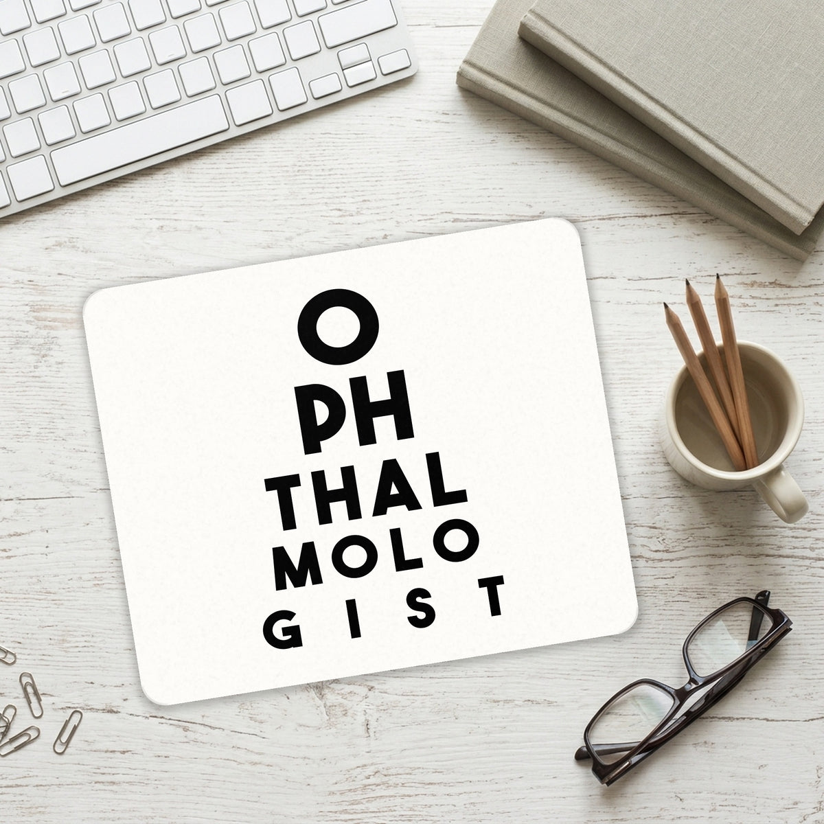 Ophthalmologist Eye Chart mouse pad on a desk with a keyboard