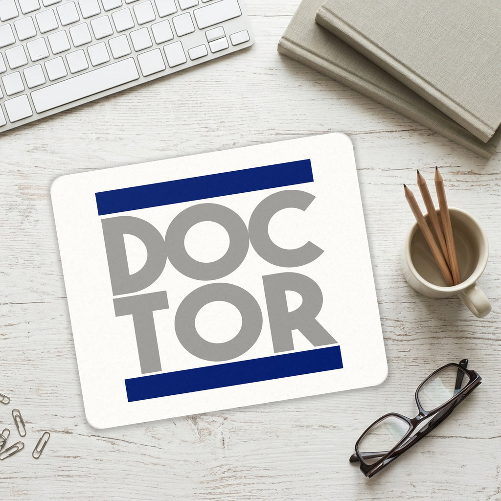 DOCTOR Word Art mouse pad on a desk with a keyboard